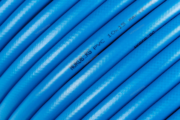 Шланг воздушный гибридный NORDBERG H1015RPVC (PVC Ø10х15мм, катушка 100 м)